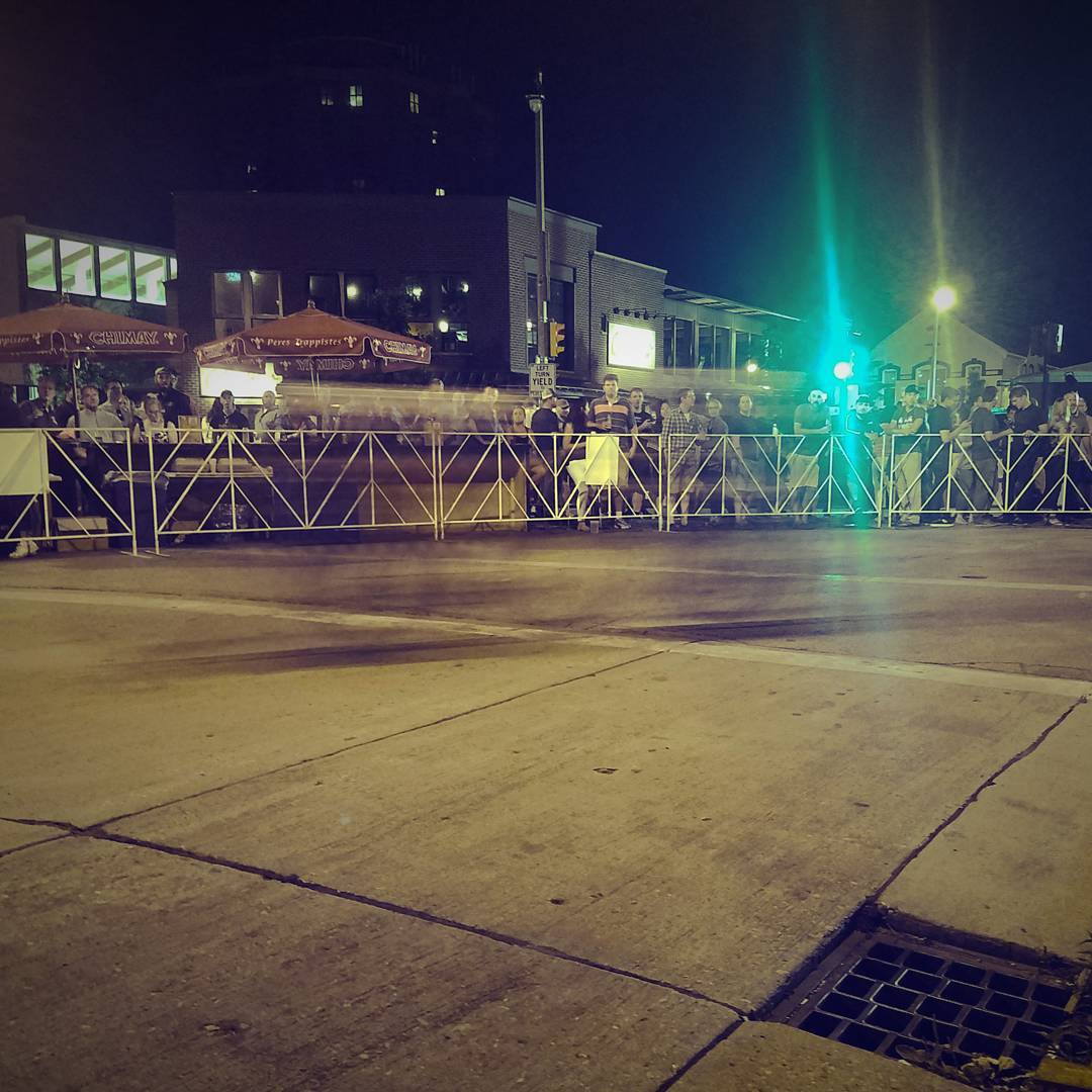 Racers blur across the screen as to become invisible at the Bay View evening criterium